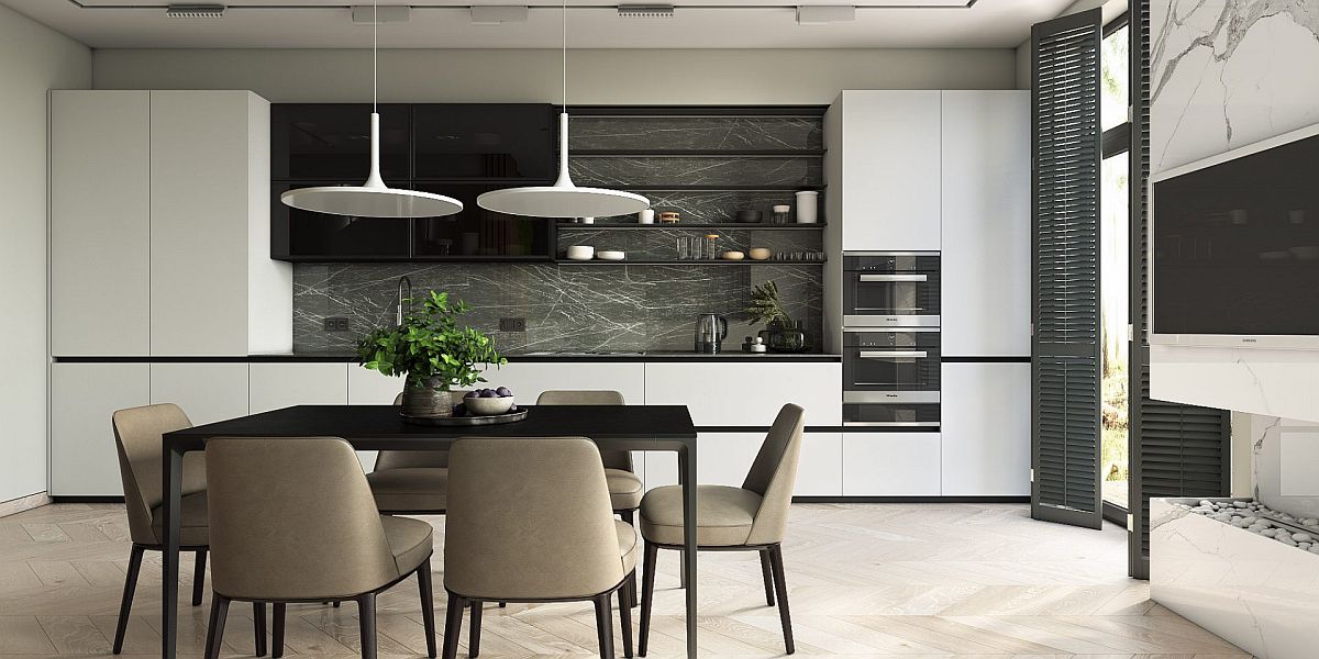 Open plan living area of the townhouse where the single-wall kitchen and dining area become a part of the living space