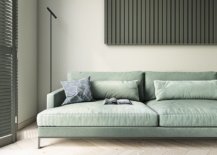 Plush-light-blue-couch-for-the-living-room-with-low-slung-design-and-a-minimal-floor-lamp-in-black-next-to-it-10033-217x155