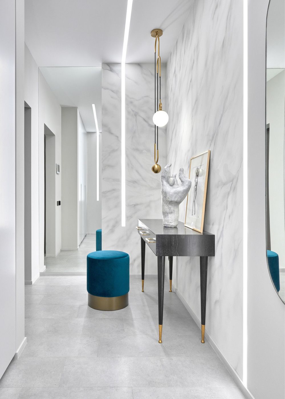 Polished-and-minimal-contemporary-hallway-of-Moscow-apartment-with-a-splash-of-blue-thrown-into-the-mix-61331