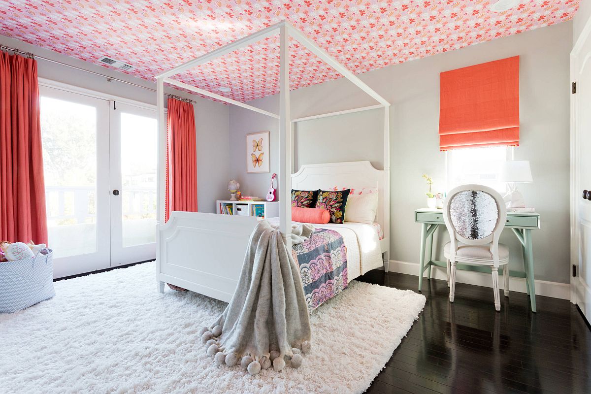 Pops of orange coupled with hot pinks in the coastal chic girls' bedroom