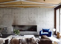 Raw-concrete-walls-in-the-living-room-along-with-wooden-ceiling-usher-in-ample-textural-contrast-10261-217x155