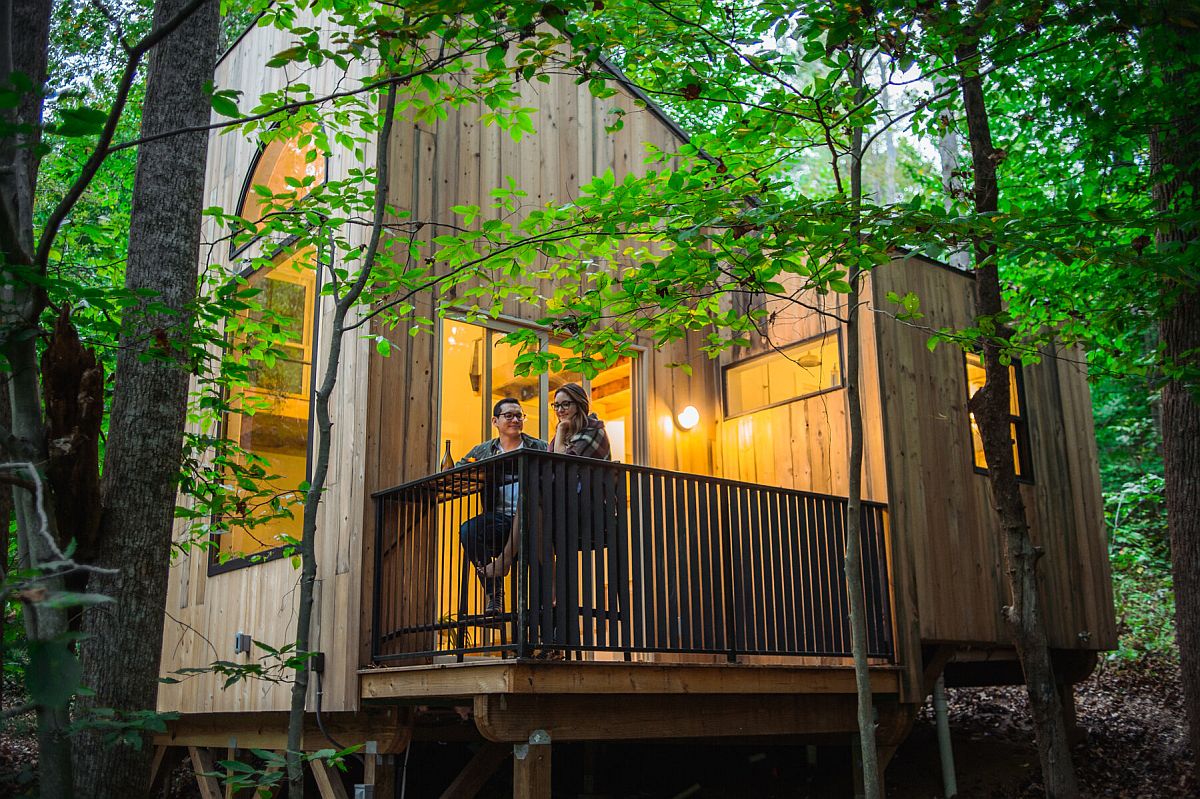 Small and private rear deck of the cabin from which one can enjoy the forest outside