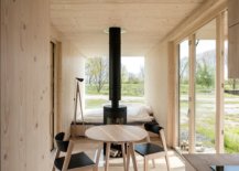 Small-and-space-savvy-interior-of-the-ARK-shelter-in-wood-that-is-used-to-shape-the-cabin-interior-14657-217x155