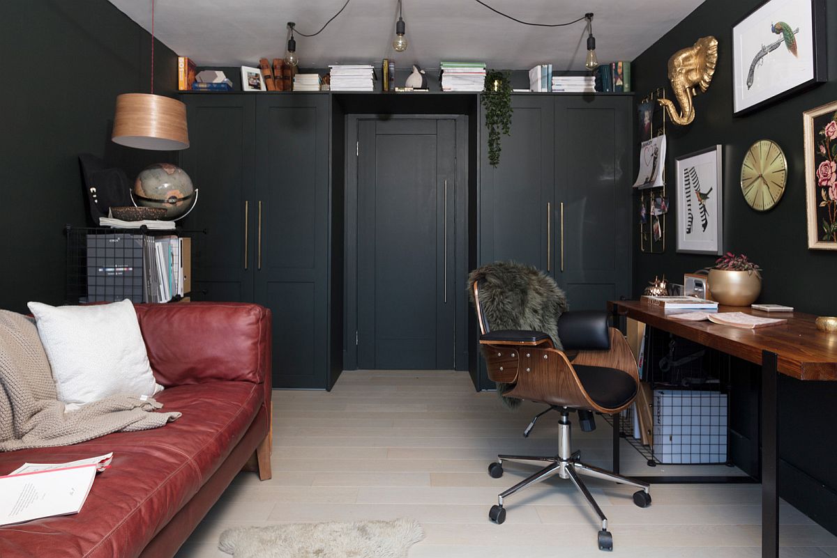 Small modern farmhouse home office with dark red sofa and space-savvy design