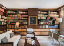 Spacious-home-library-with-glass-table-chairs-and-multiple-seating-options-84200-217x155