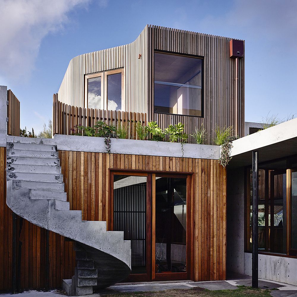 Spiral staircase leads to the locally planted rooftop gardens on the upper level of the house