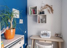 Tiny-desk-in-the-corner-acts-as-the-crafting-station-in-this-delightful-little-blue-and-white-crafts-room-41618-217x155