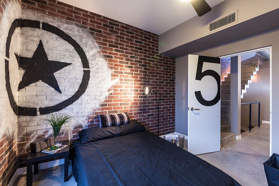 Turn the exposed brick wall into the highlight of the bedroom with graffiti