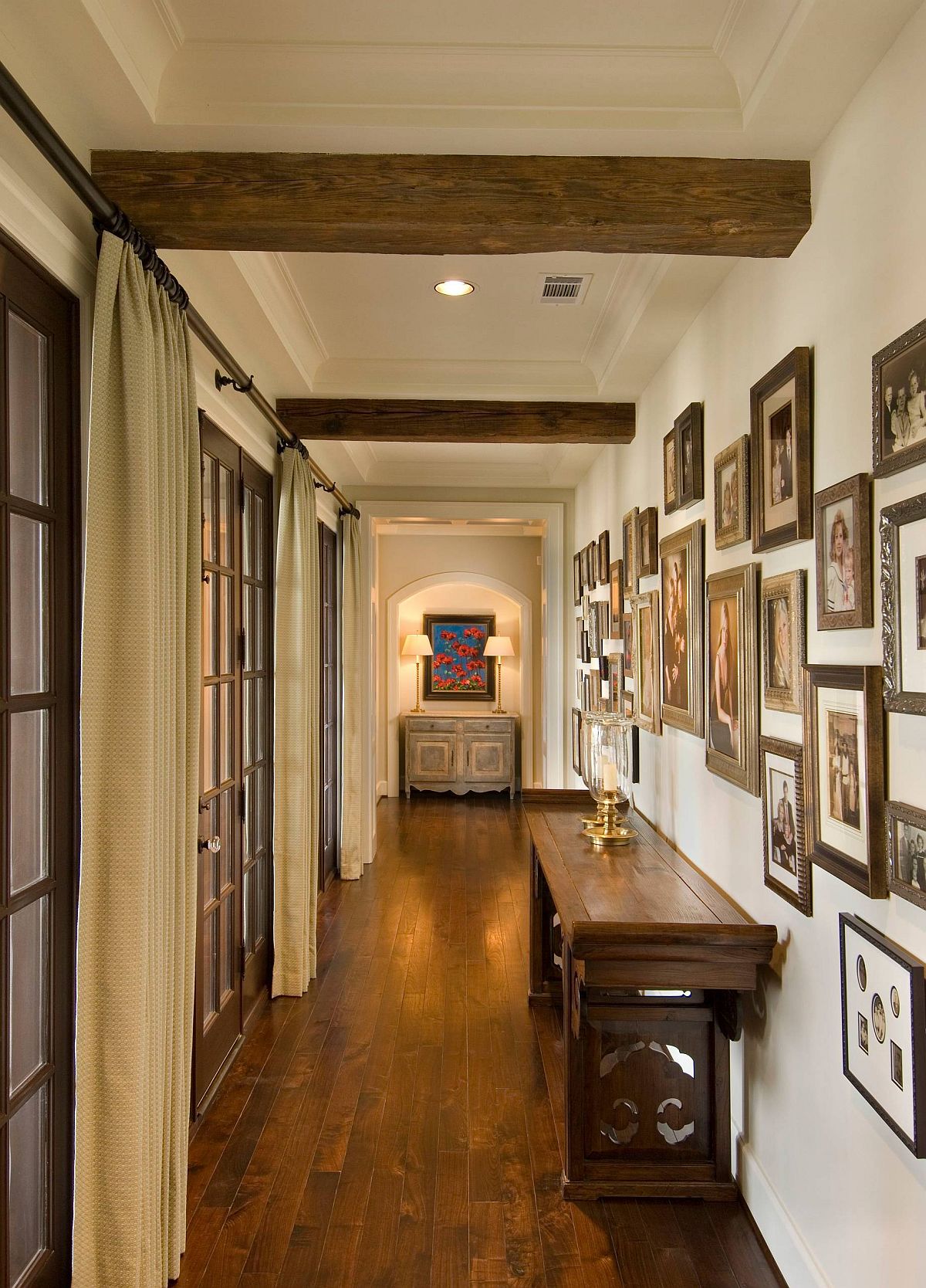 Using frames in similar finish gives this hallway a more beautiful visual appeal