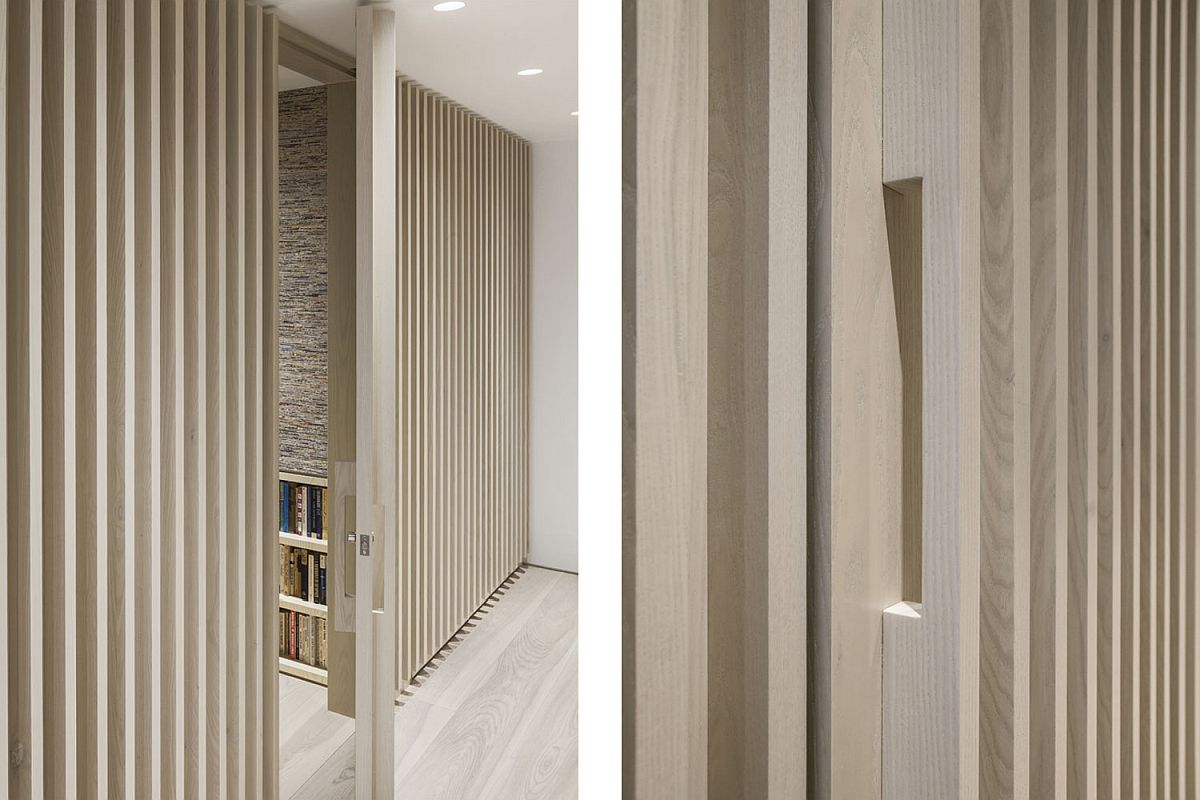 Vertical battens shape the entry of the Manhattan loft