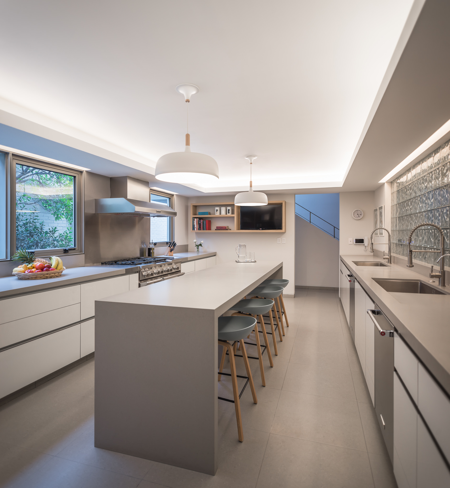 White and gray kitchen of the house with lovely lighting