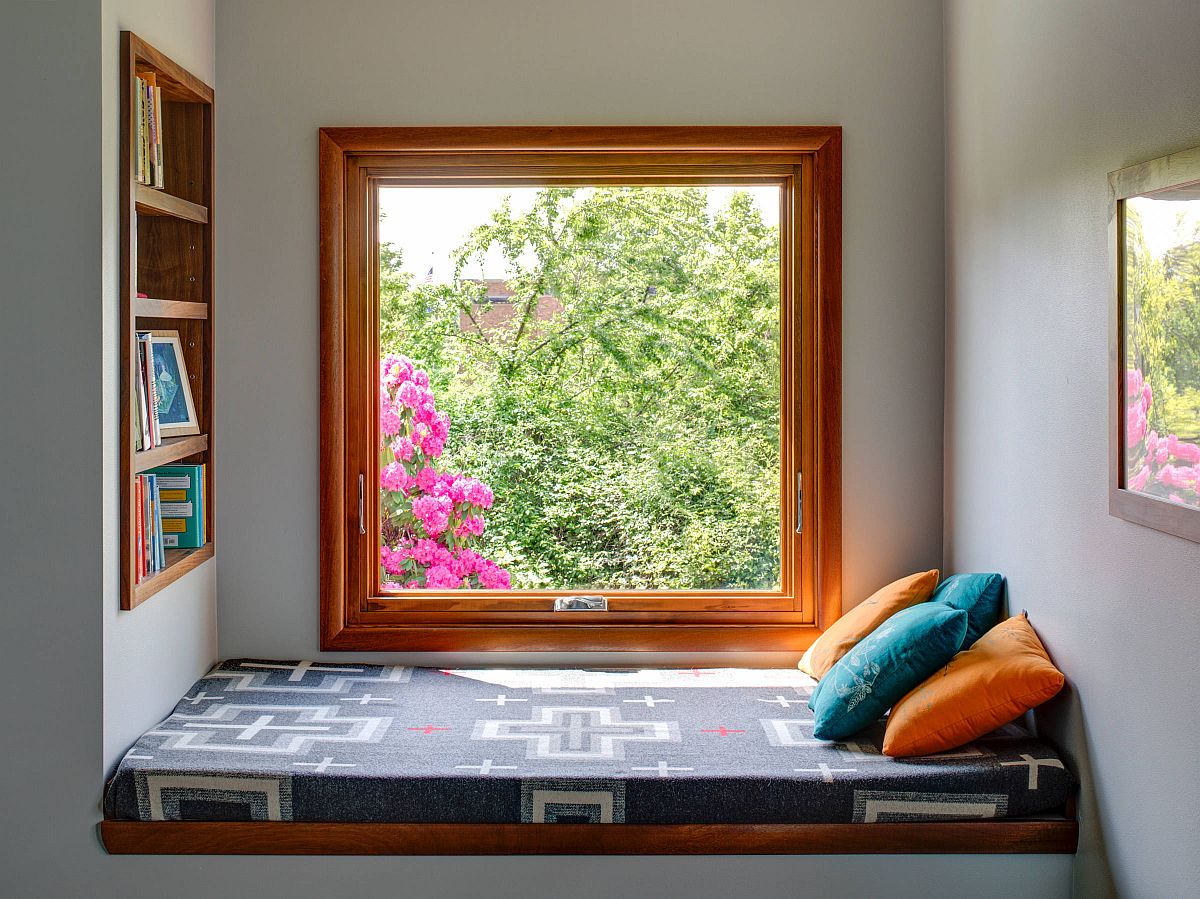 Window seats in the bedroom provide the most comfortable place for a relaxing reading nook