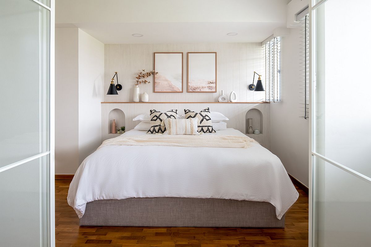 Wooden floor along with white walls creates a beautiful modern Scandinavian bedroom