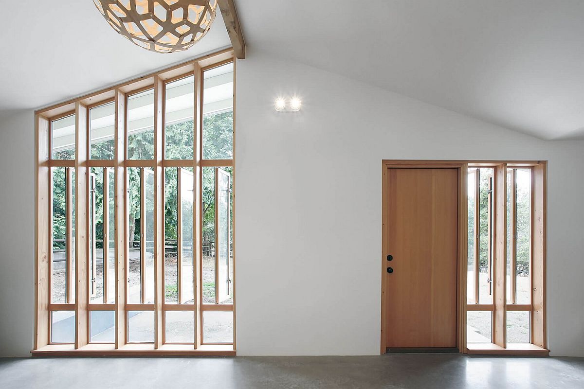 Wooden windows and doors swivel open to bring in more ventilation