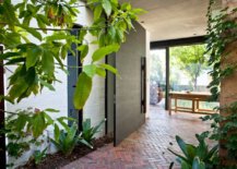 Brick-floor-works-brilliantly-in-the-contemporary-entryway-as-well-83670-217x155