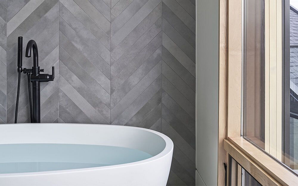 Contemporary bathroom backdrop with chevron pattern tiles in gray