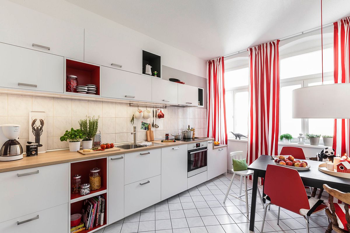 Curtains add both color and pattern to this light-filled modern kitchen