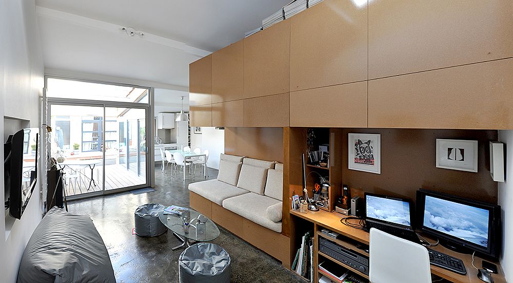 Custom box-inside-a-box design adds private space inside the open, light-filled apartment