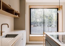 Custom-oak-window-of-the-rear-extension-brings-light-into-the-modern-kitchen-82042-217x155