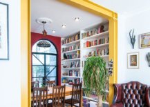 Custom-steel-frame-that-is-painted-mustard-yellow-connects-the-previously-delineated-spaces-and-creates-new-aesthetics-37169-217x155