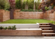 Custom-wooden-bench-in-the-backyard-aso-serves-as-a-storage-option-92062-217x155