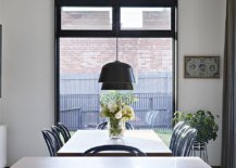 Dark-pendants-bring-visual-contrast-to-the-contemporary-dining-space-in-neutral-hues-28244-217x155