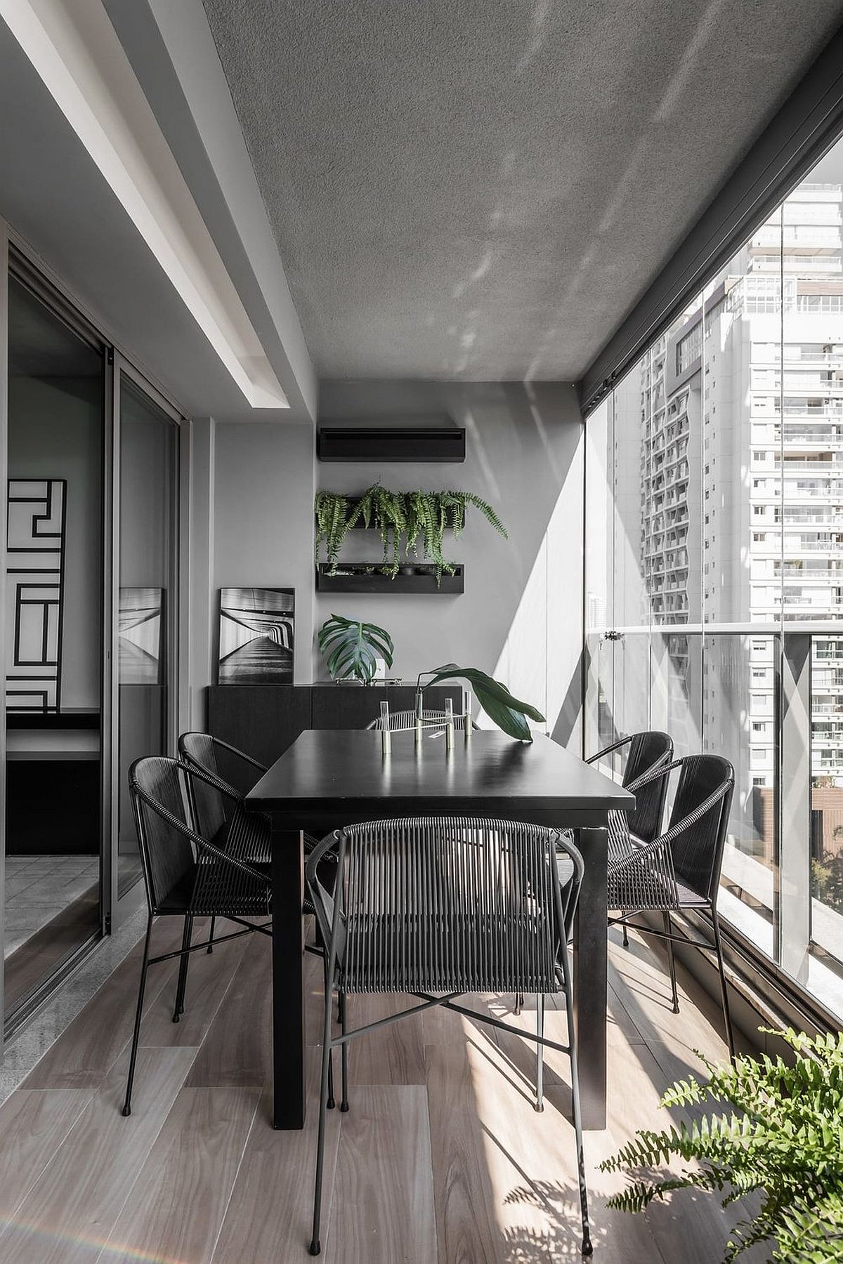 Dining outside in the balcony with a view of the sparkling city skyline