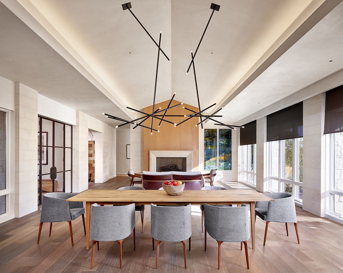 Expansive living room and dining area of the renovated residence atop a secluded cove in Westlake, Austin