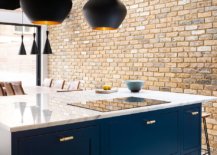 Exposed-brick-wall-of-the-kitchen-brings-an-industrial-dynamic-to-the-modern-space-72996-217x155