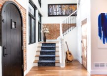 Exposed-brick-wall-sections-for-the-entryway-make-an-instant-impact-thanks-to-the-white-walls-all-around-43917-217x155