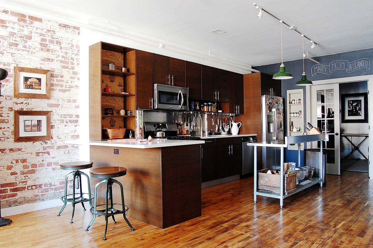 Eye-catching-Brooklyn-apartment-with-open-island-in-steel-along-with-wooden-cabinets-and-a-splash-of-blue-93841
