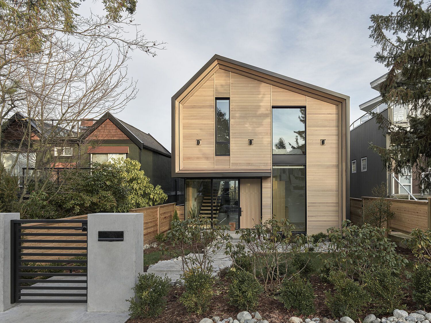 Fabulous multi-level family house in Vancouver with a warm wooden exterior