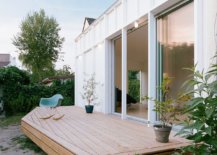Glass-doors-connect-the-new-living-room-with-the-small-open-deck-outside-and-extend-the-interior-on-summer-days-27693-217x155