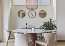 Gorgeous-and-minimal-wood-and-white-dining-area-with-indoor-plant-and-snazzy-pendant-light-76719-217x155