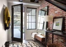 Gorgeous-industrial-style-entryway-of-stylish-Seattle-home-with-an-exposed-brick-wall-76828-217x155