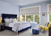 Light-blue-walls-along-with-the-dark-blue-bed-create-a-tone-on-tone-look-in-the-modern-bedroom-95842-217x155