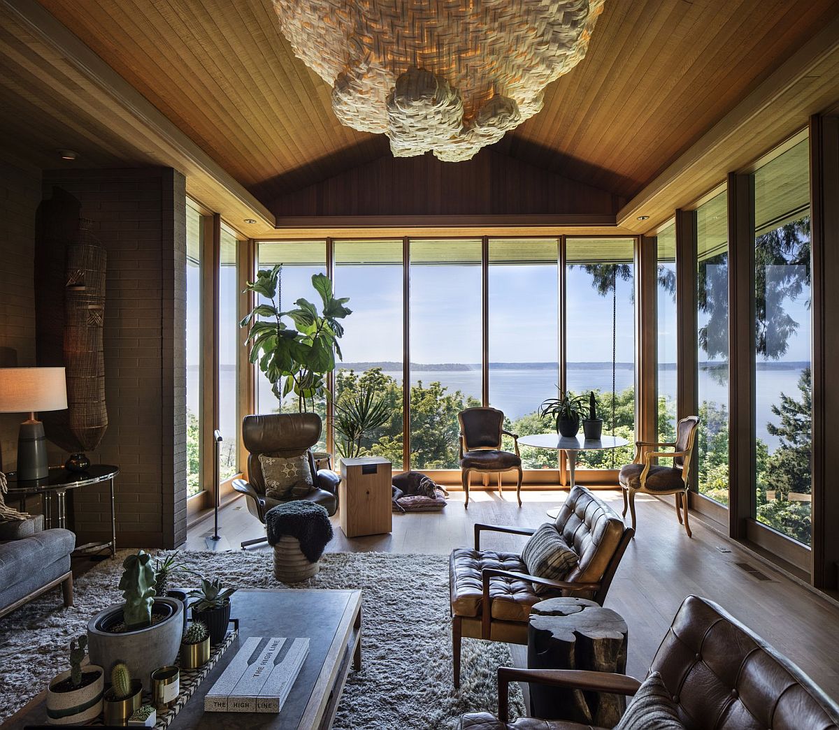 Living room nestled on the edge of the cliff offers some of the most amazing views at the house