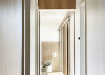 Long-corridors-in-white-and-wood-bring-ample-natural-light-into-this-revamped-St