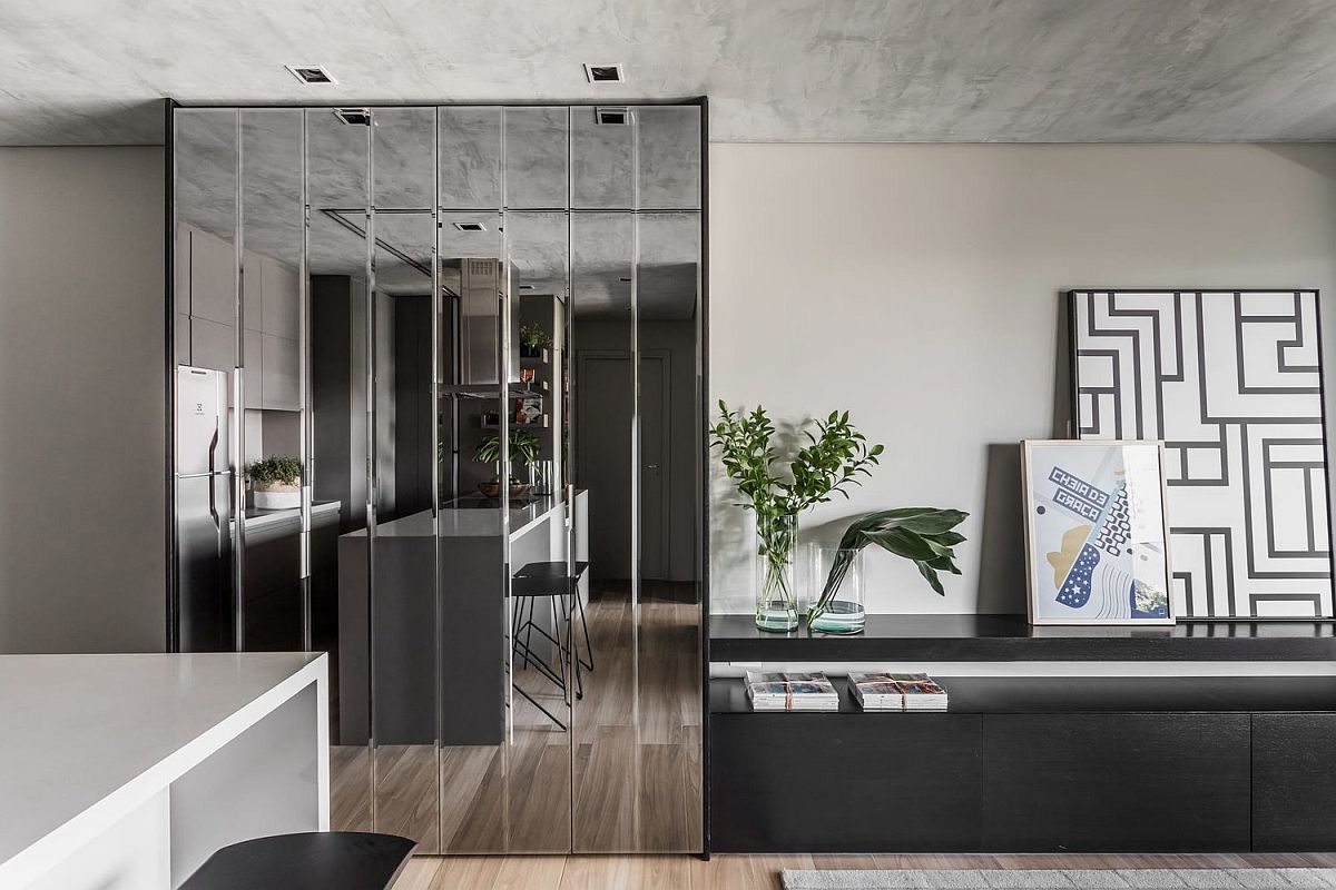 Mirrored cabinet door give the interior of the apartment a more spacious visual appeal