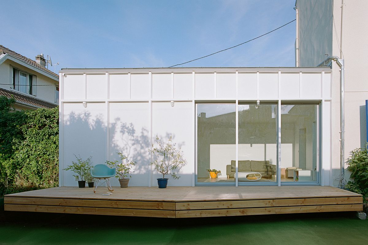 Modern Infusion: Elevated Wooden Deck Extends this Modest 60?s Home in Paris