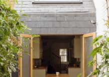 Modern-Slim-House-in-London-with-a-gray-and-wood-exterior-and-a-sloped-ceiling-that-has-staggered-skylight-43232-217x155