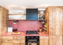 Modern-eclectic-kitchen-with-custom-concrete-worktop-and-backsplash-in-red-39577-217x155