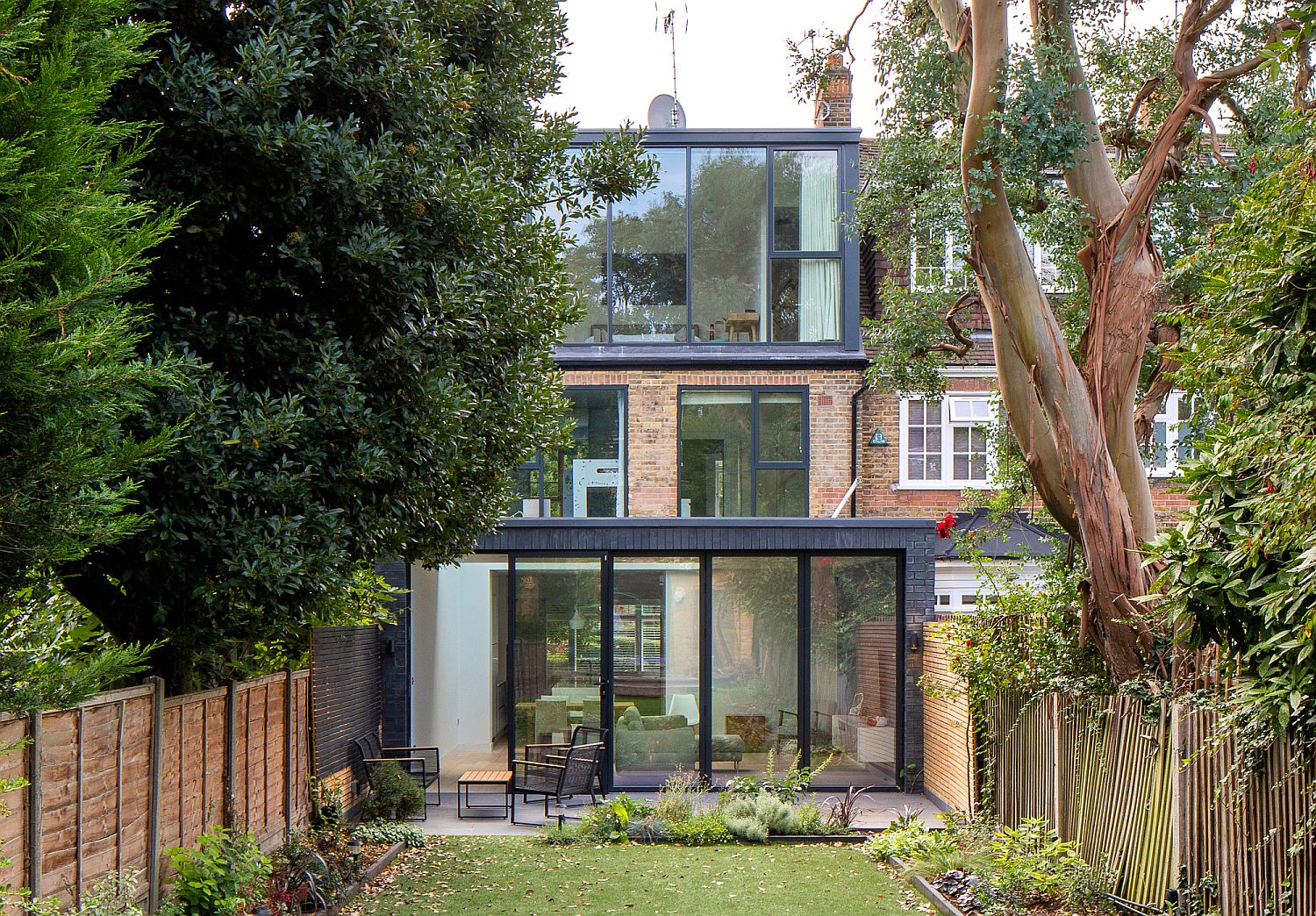 Multi-level rear extension of Classic home in London designed by Studio 30 Architects