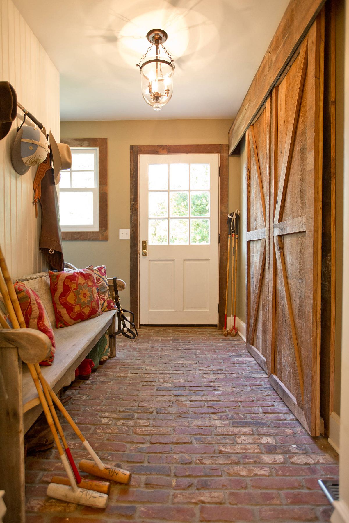 Red brick floor brings a hint of earthen rustic charm to any entryway it adorns