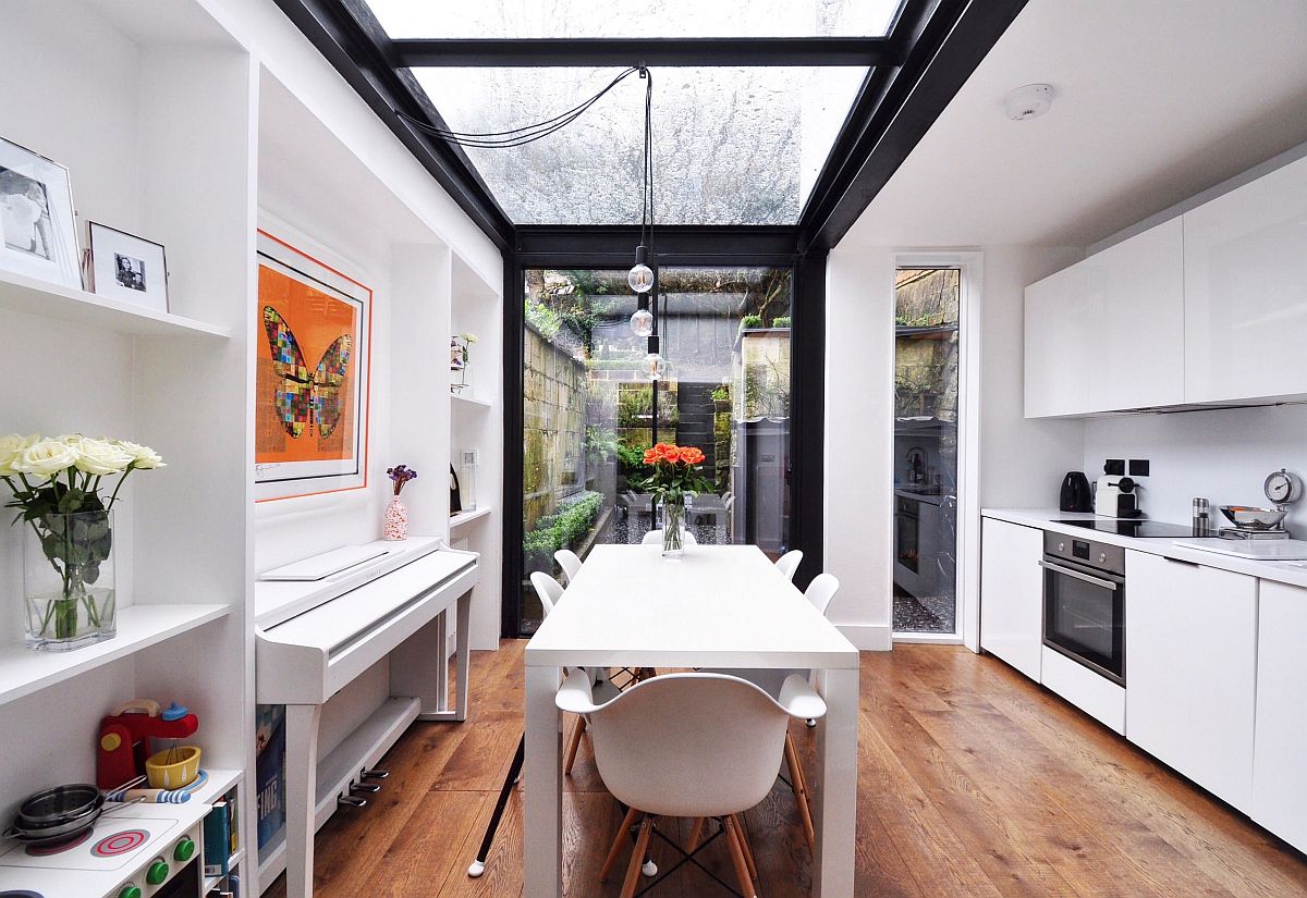 Roof lights and floor-to-ceiling glass walls are the perfect way to bring the outdoors inside