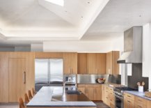SKylights-and-glass-doors-bring-a-flood-of-natural-light-into-the-double-height-contemporary-kitchen-with-an-air-of-minimalism-92107-217x155
