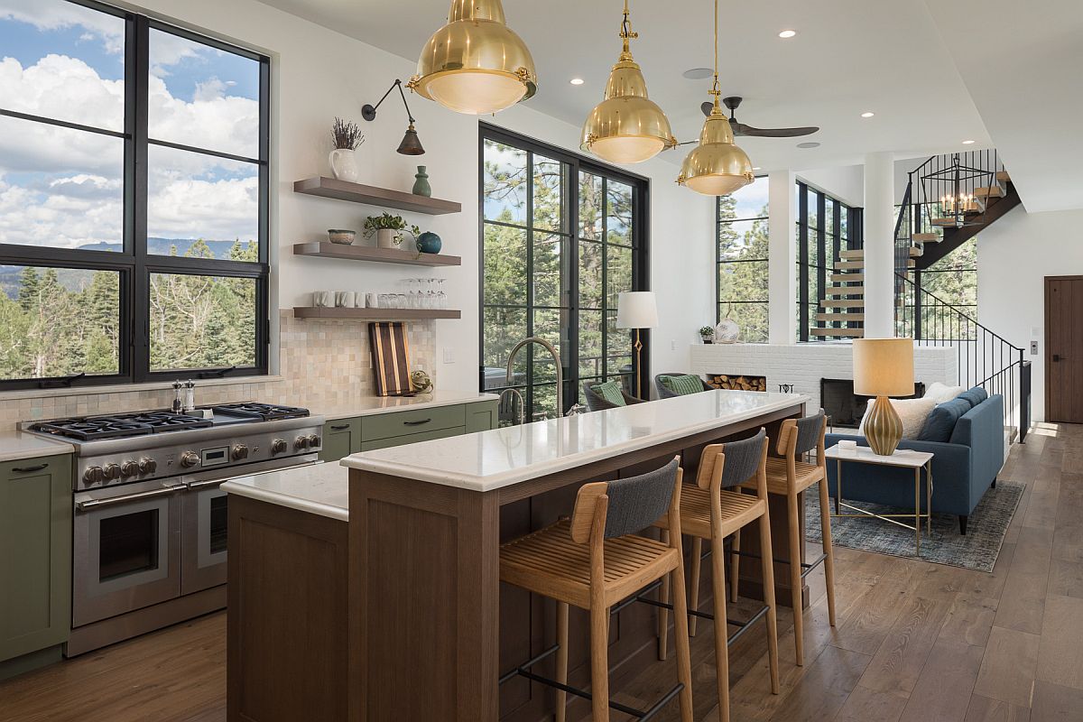 Series of fabulous windows and doors connect this mdoern kitchen with the outdoors