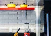 Sleek-floating-shelves-in-orange-add-color-to-the-white-tiled-kitchen-backsplash-46425-217x155