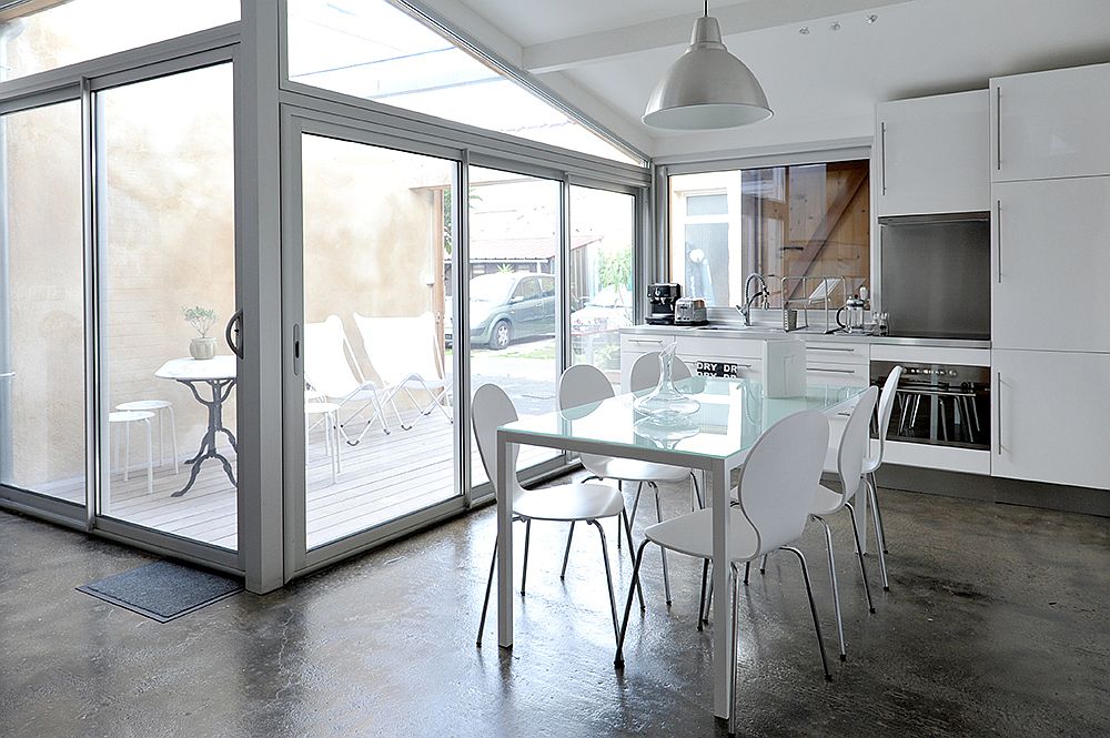 Sliding glass doors convert the closed garage into a lovely modern apartment