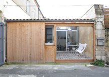 Sliding-wooden-doors-of-the-garage-replace-the-traditional-metallic-exterior-of-the-garage-turned-into-small-home-22535-217x155